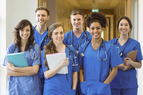 Medical students smiling at the camera